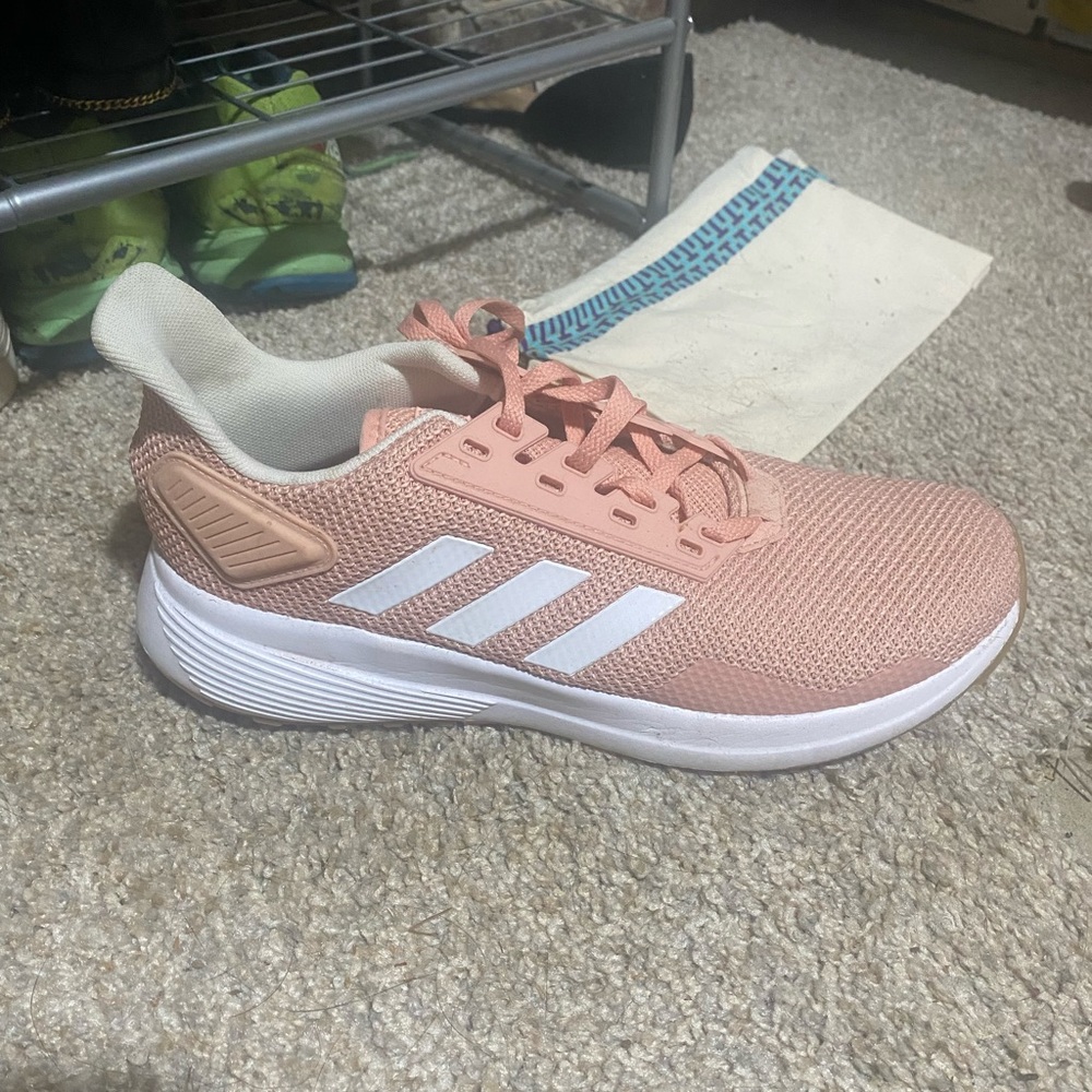 Adidas athletic shoes. Worn 1 time around the house